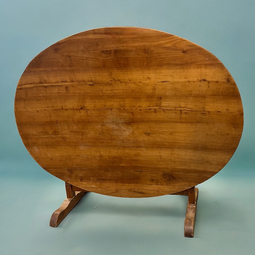 Oval wine table in fruitwood